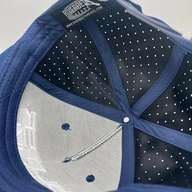 OBX Embroidery on a Blue Performance Hat with White Rope